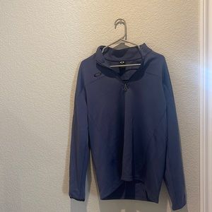 Oakley have zip, in great condition. Size Medium